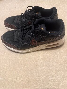 Nike Women's Black Athletic Sneakers with Leopard Accent